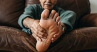 Older adult caring for foot health as part of aging process.